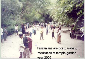 2002 Tanzanian young boys and girls getting traning about walking and sitting meditation at Buddh.jpg